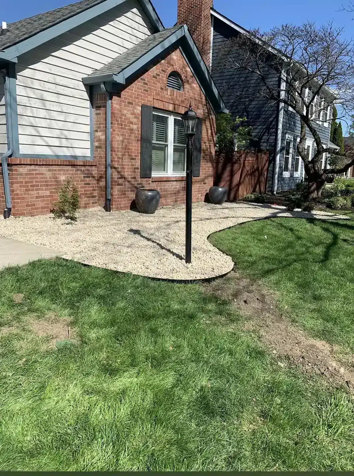 Gravel path installed beside a brick home in Carmel, IN