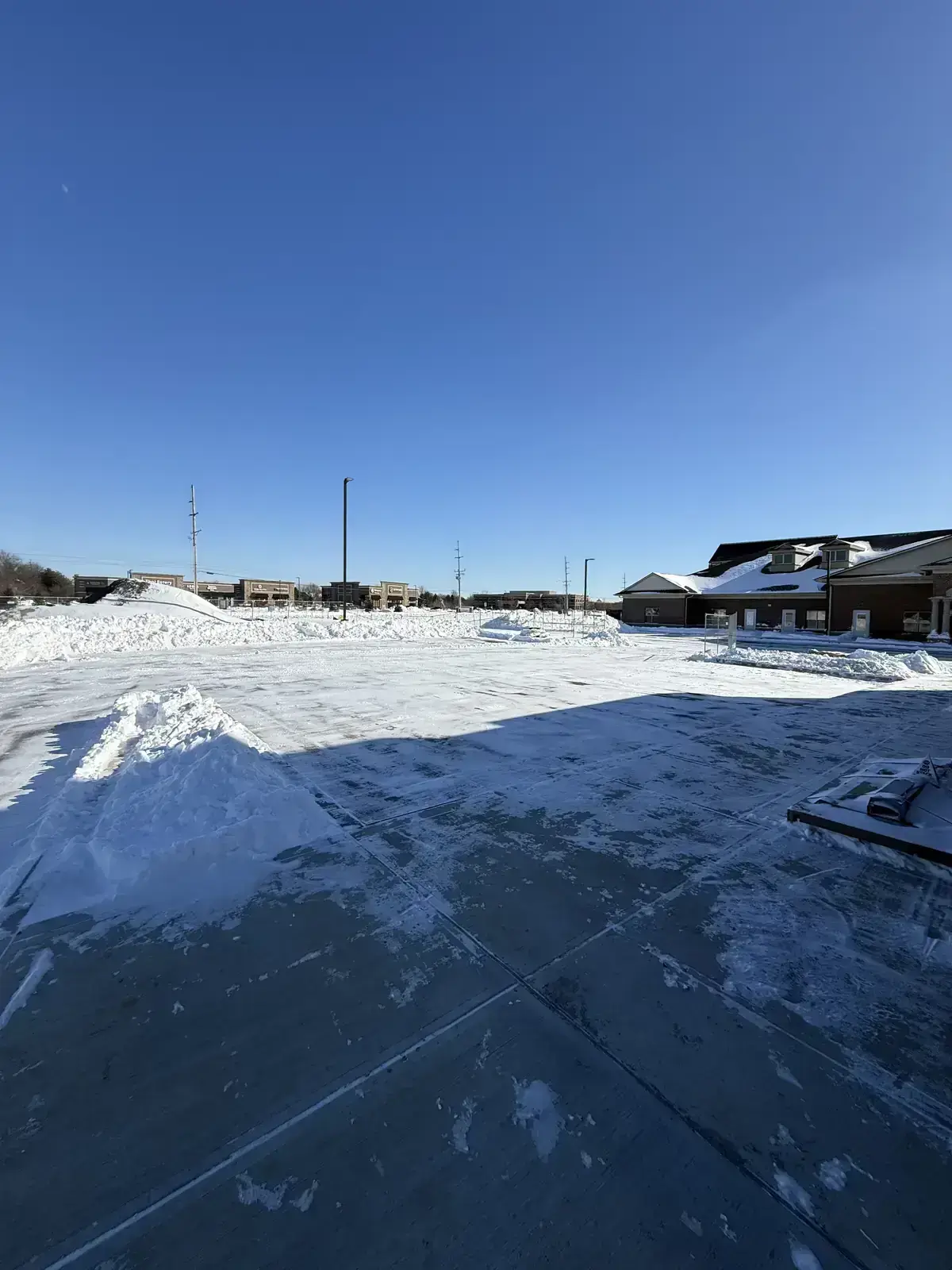 Plowed commercial parking lot in Carmel, IN