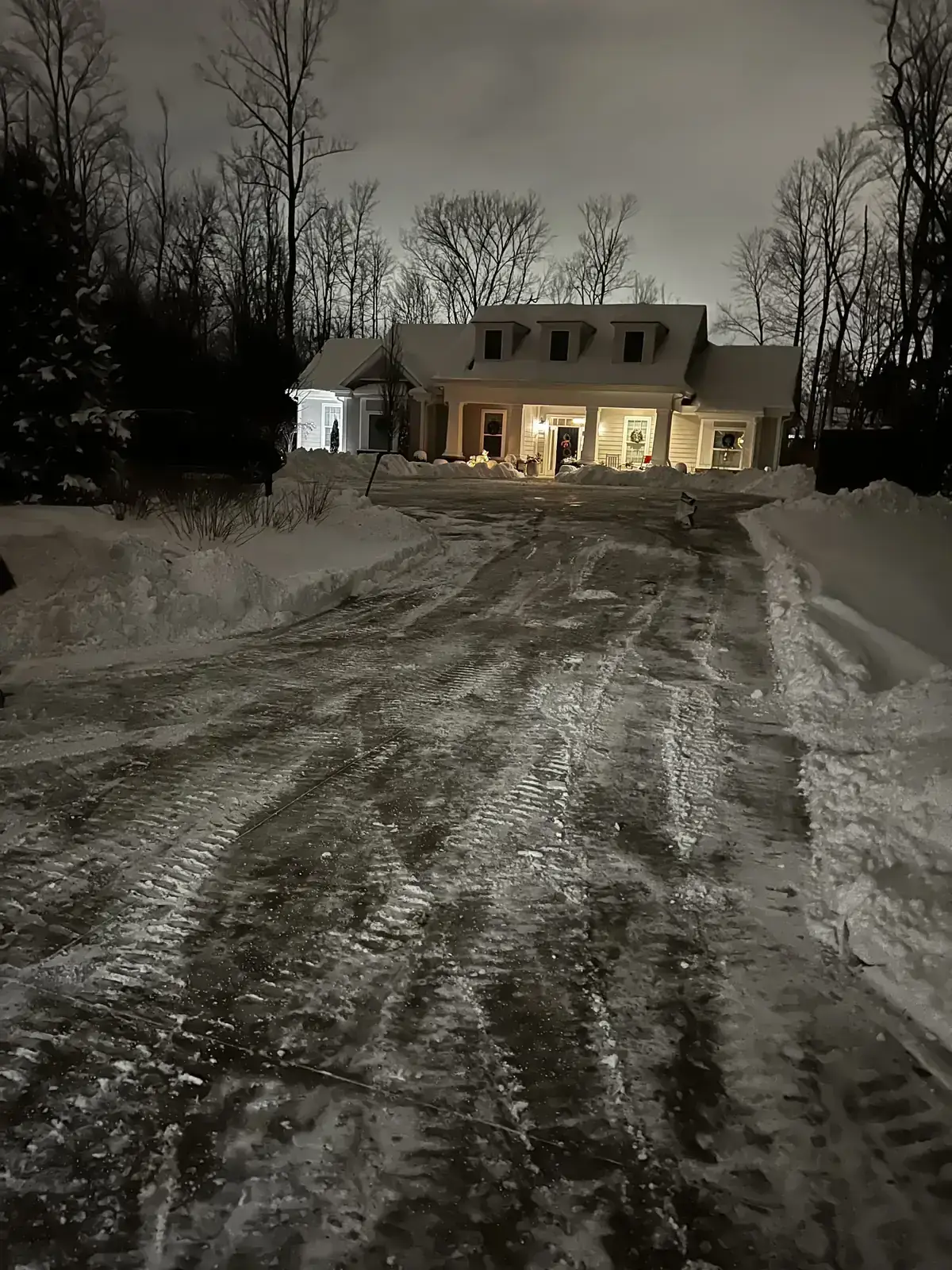 Overnight plowing of a long driveway in Carmel, IN